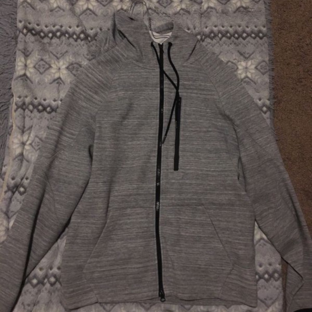 Grey zip-up jacket.